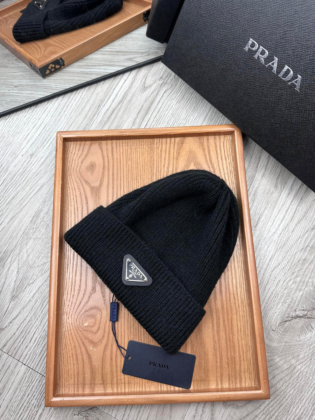 PRADA BEANIE HAT IN BLACK WOOL 332393