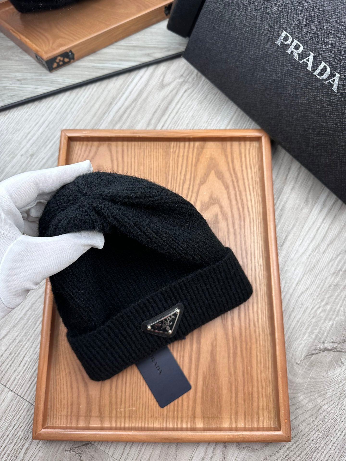 PRADA BEANIE HAT IN BLACK WOOL 332393