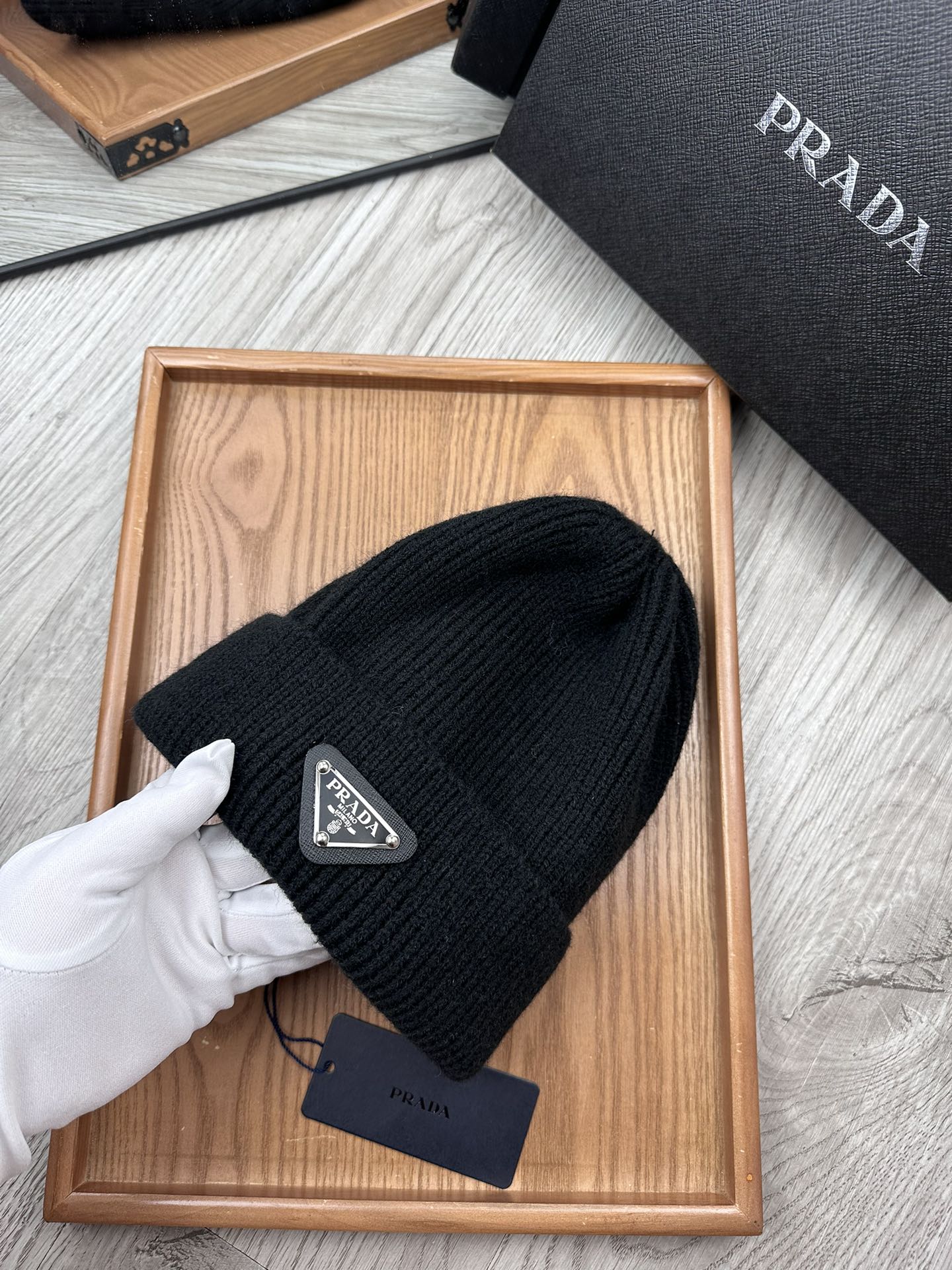 PRADA BEANIE HAT IN BLACK WOOL 332393