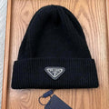 PRADA BEANIE HAT IN BLACK WOOL 332393