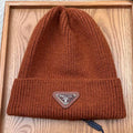 PRADA BEANIE HAT IN UMBER BROWN WOOL 332398