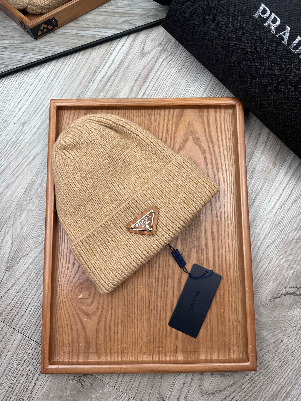 PRADA BEANIE HAT IN LIGHT BROWN WOOL 332402
