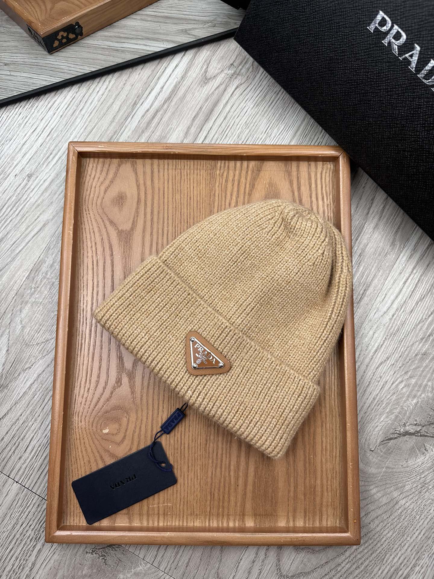 PRADA BEANIE HAT IN LIGHT BROWN WOOL 332402
