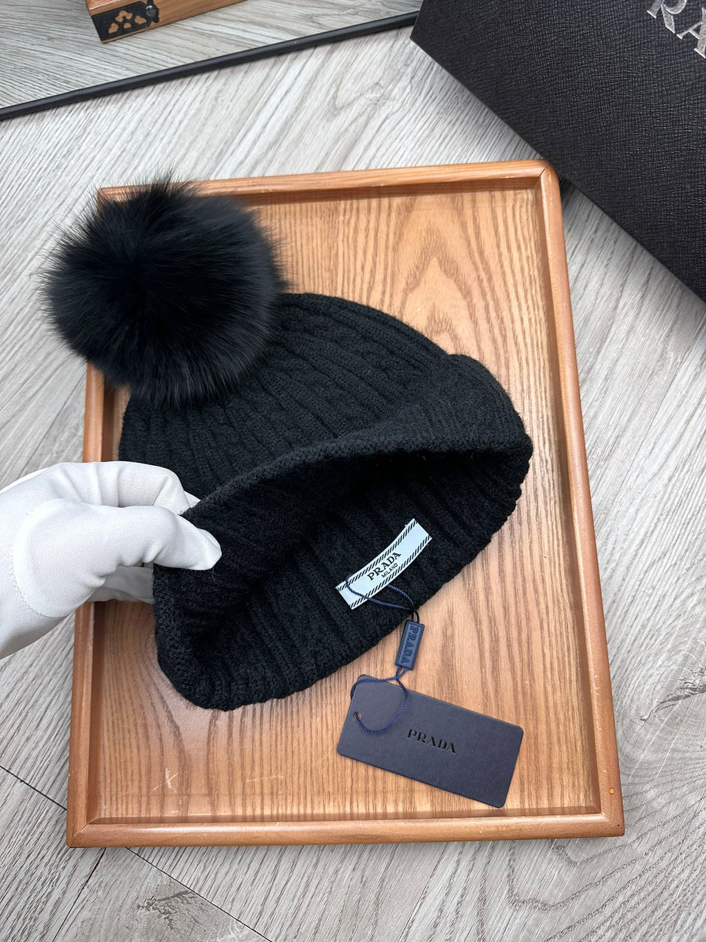 PRADA BEANIE HAT IN BLACK WOOL 352368