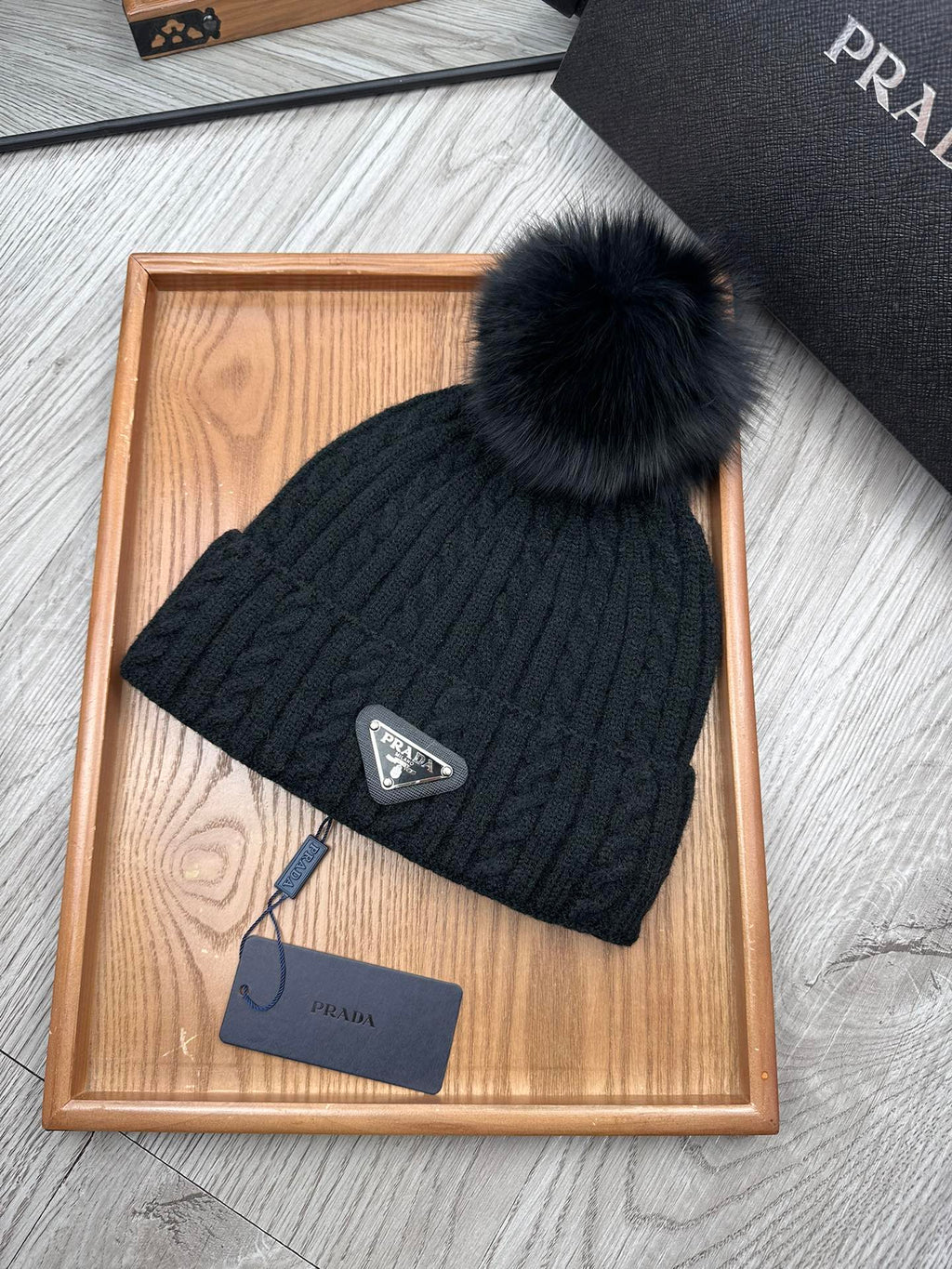 PRADA BEANIE HAT IN BLACK WOOL 352368