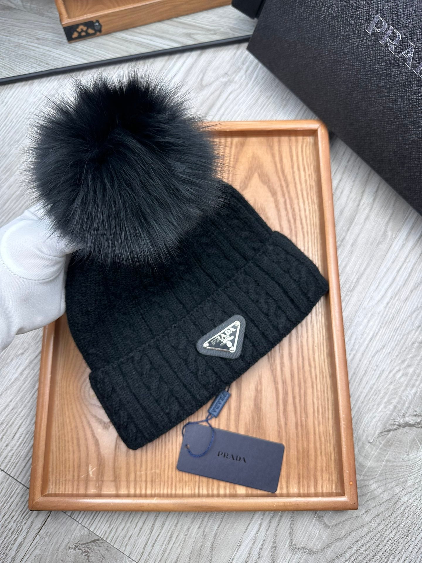 PRADA BEANIE HAT IN BLACK WOOL 352368