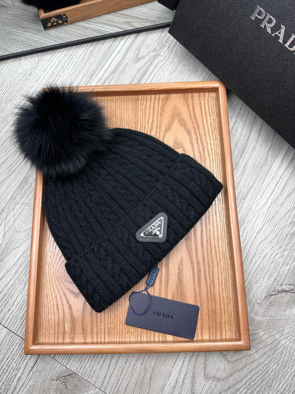 PRADA BEANIE HAT IN BLACK WOOL 352368