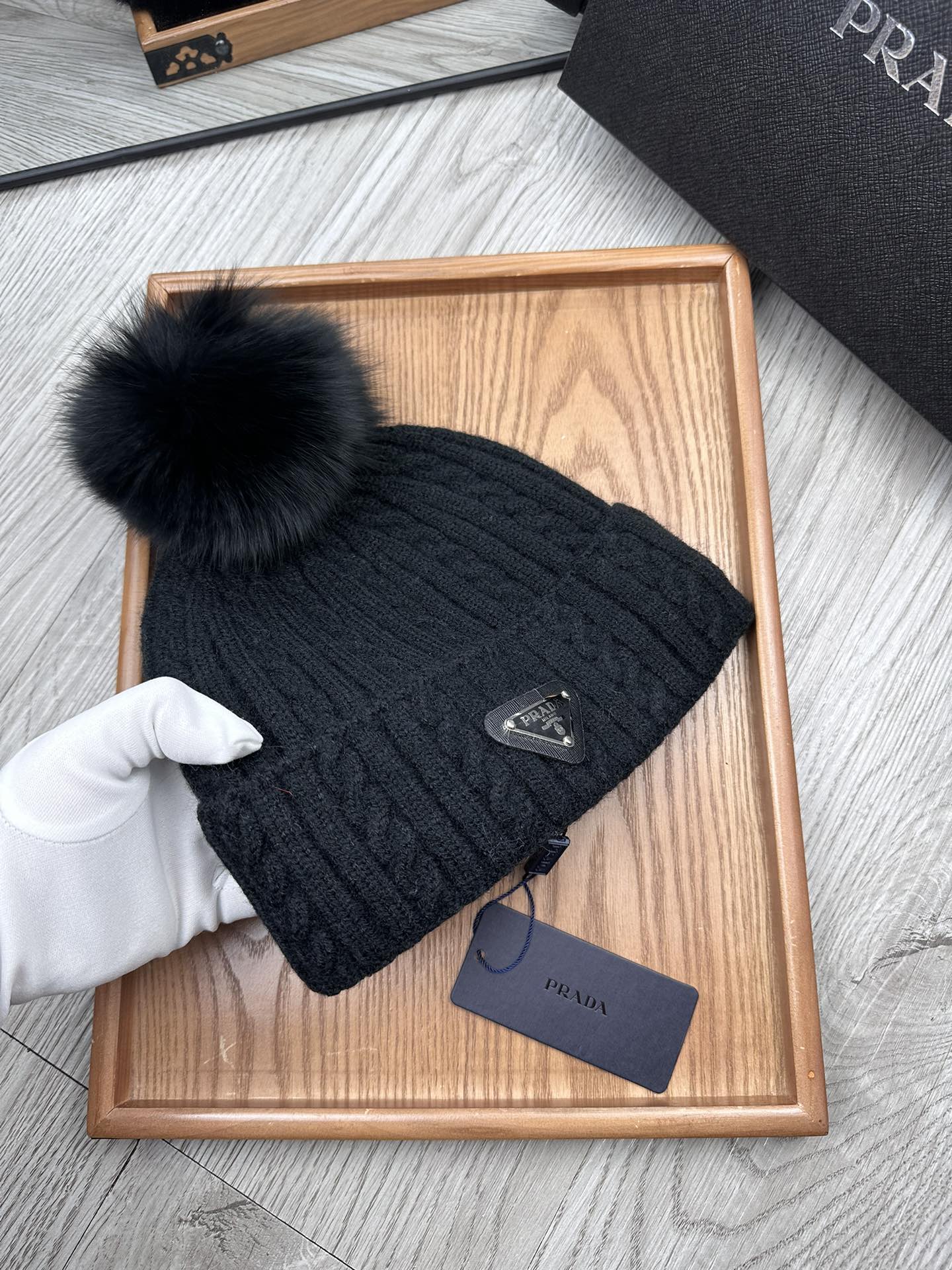 PRADA BEANIE HAT IN BLACK WOOL 352368