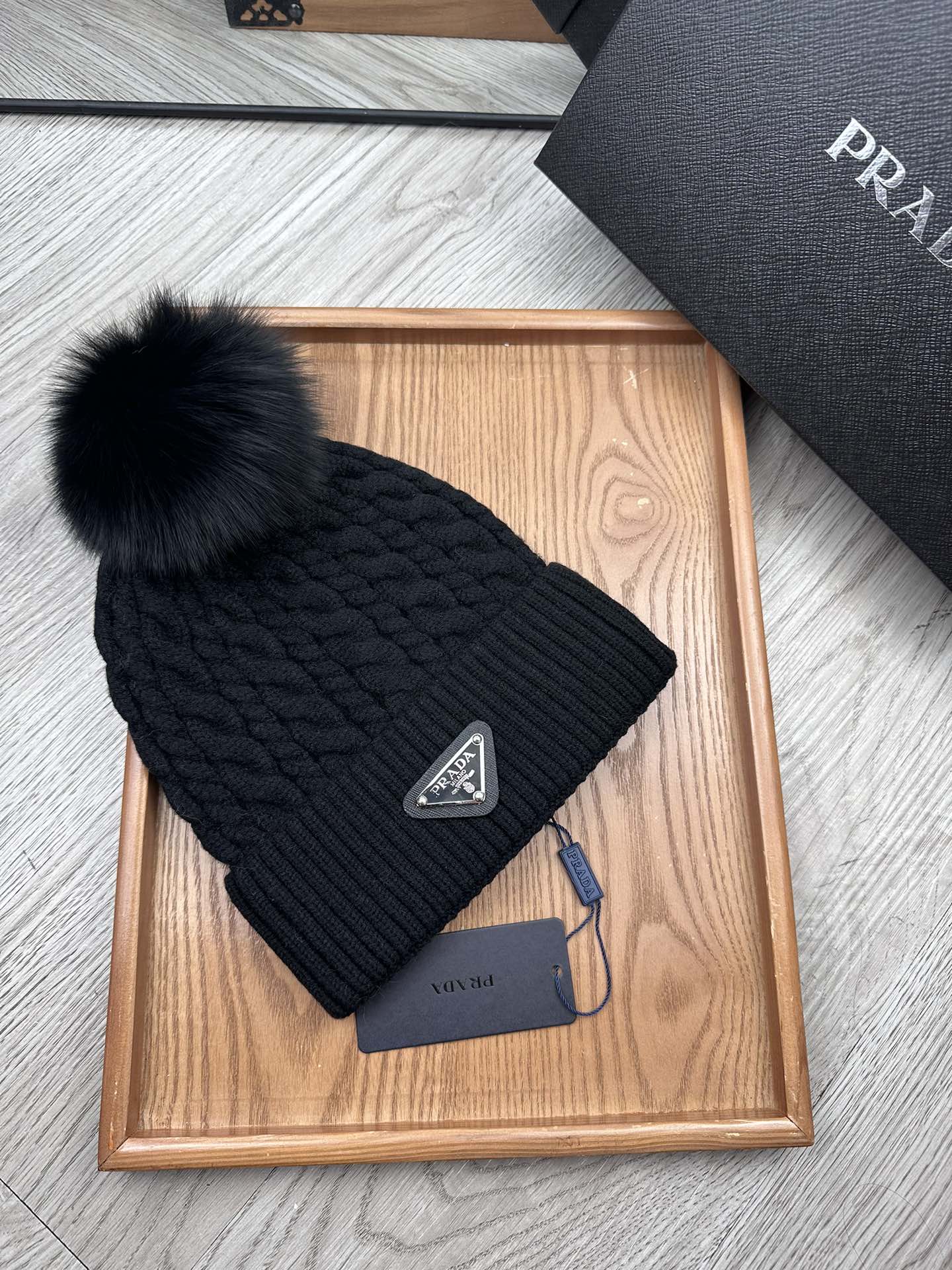 PRADA BEANIE HAT IN BLACK WOOL 352375