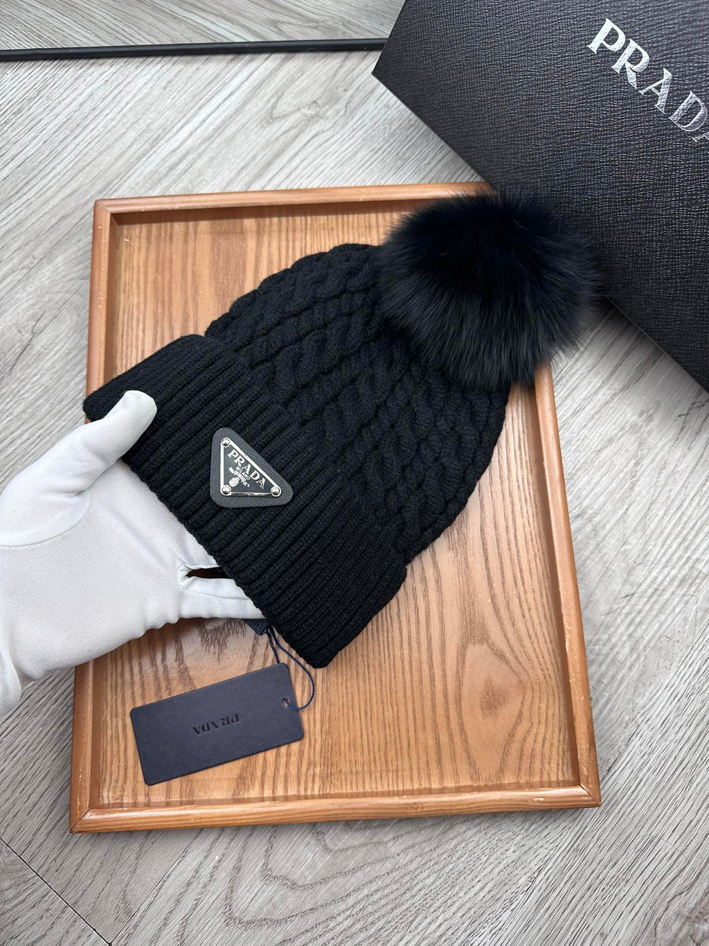 PRADA BEANIE HAT IN BLACK WOOL 352375