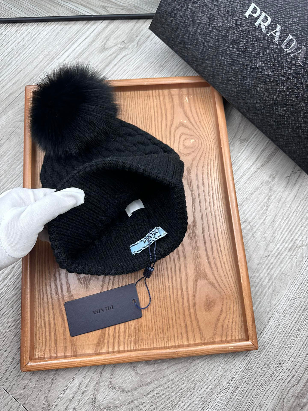 PRADA BEANIE HAT IN BLACK WOOL 352375