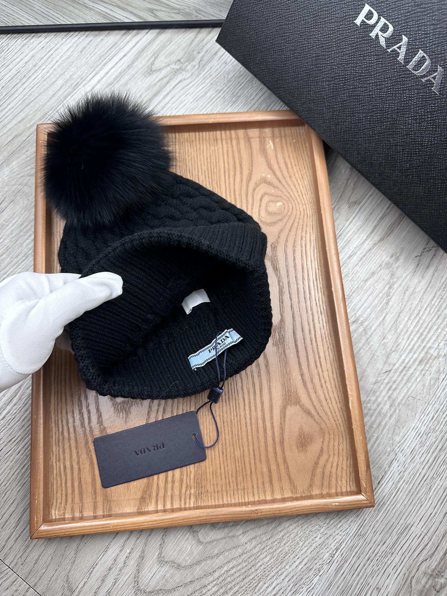 PRADA BEANIE HAT IN BLACK WOOL 352375