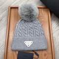 PRADA BEANIE HAT IN COIN GRAY WOOL 352378