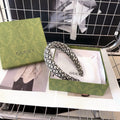 GUCCI THICK HEADBAND IN WHITE MIX BLACK MONOGRAM CANVAS 406136