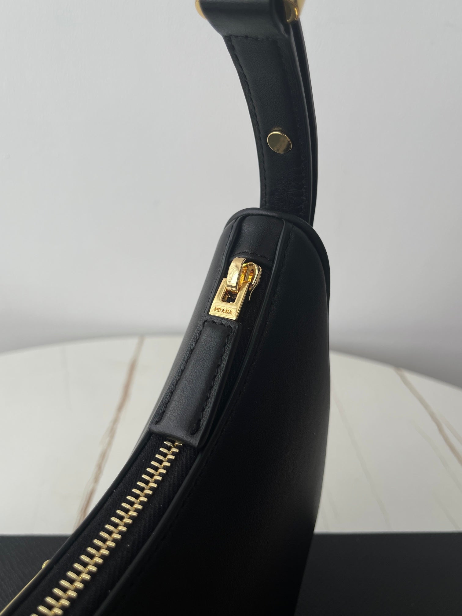 PRADA ARQUÉ 22 SHOULDER BAG IN BLACK LEATHER