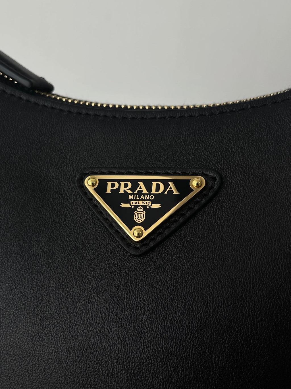 PRADA ARQUÉ 22 SHOULDER BAG IN BLACK LEATHER