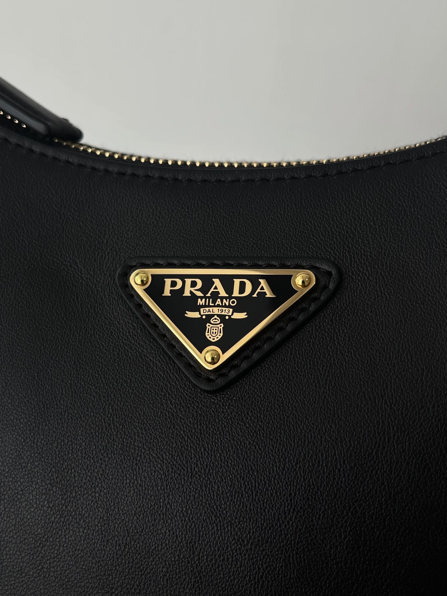 PRADA ARQUÉ 22 SHOULDER BAG IN BLACK LEATHER