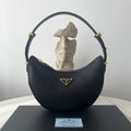 PRADA ARQUÉ 22 SHOULDER BAG IN BLACK LEATHER