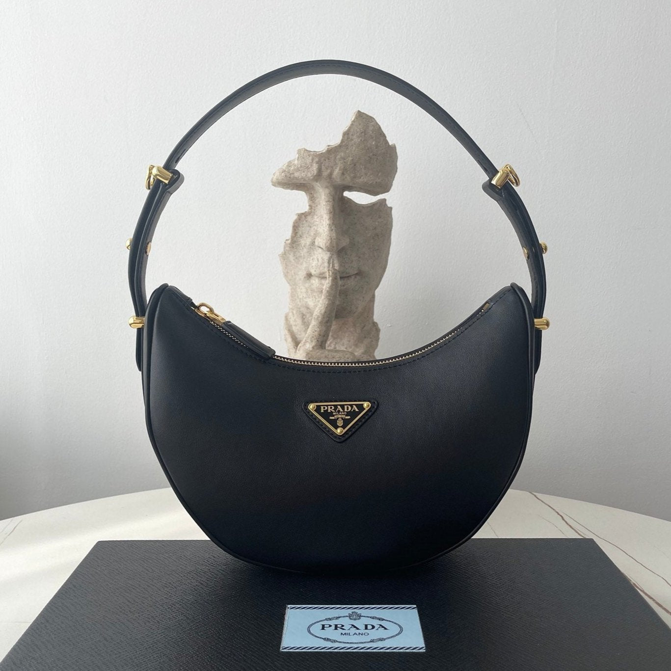PRADA ARQUÉ 22 SHOULDER BAG IN BLACK LEATHER