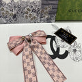 GUCCI RIBBON BOW HAIR CLIP IN BABY PINK RE-NYLON ATTACHED PEARL 358259