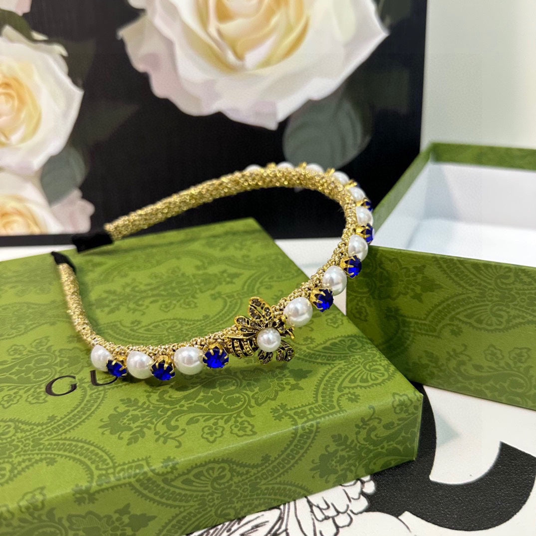 GUCCI HAIRBAND EMBELLISHED DIAMOND AND PEARL IN GOLD METAL 376822