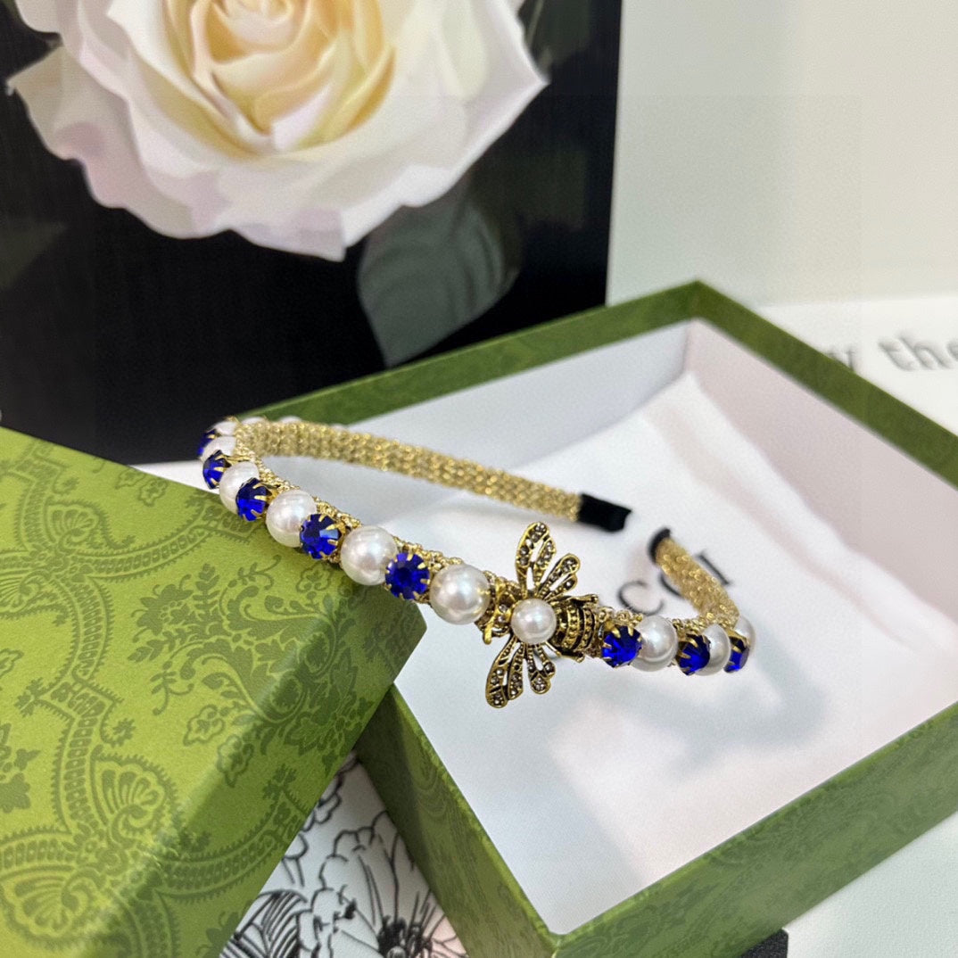 GUCCI HAIRBAND EMBELLISHED DIAMOND AND PEARL IN GOLD METAL 376822