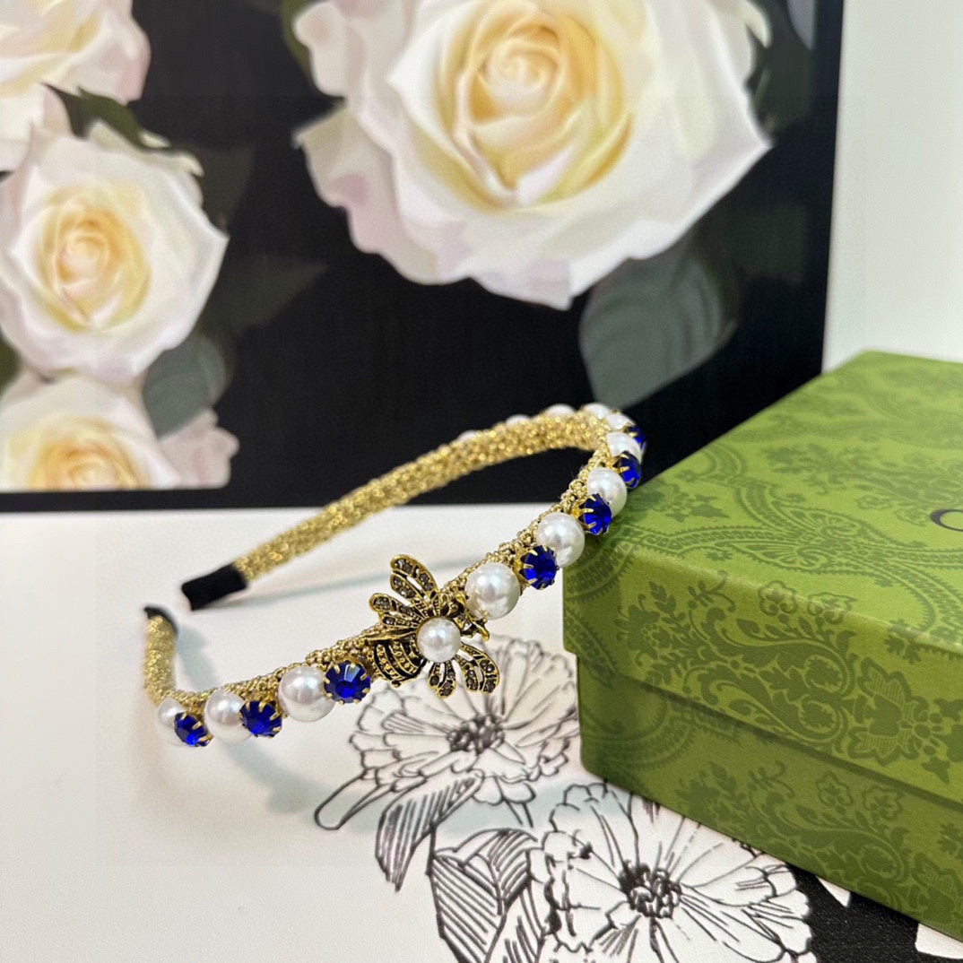 GUCCI HAIRBAND EMBELLISHED DIAMOND AND PEARL IN GOLD METAL 376822