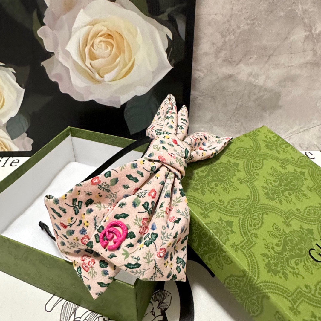 GUCCI HAIRBAND IN LIGHT PINK FLORAL FABRIC 385853