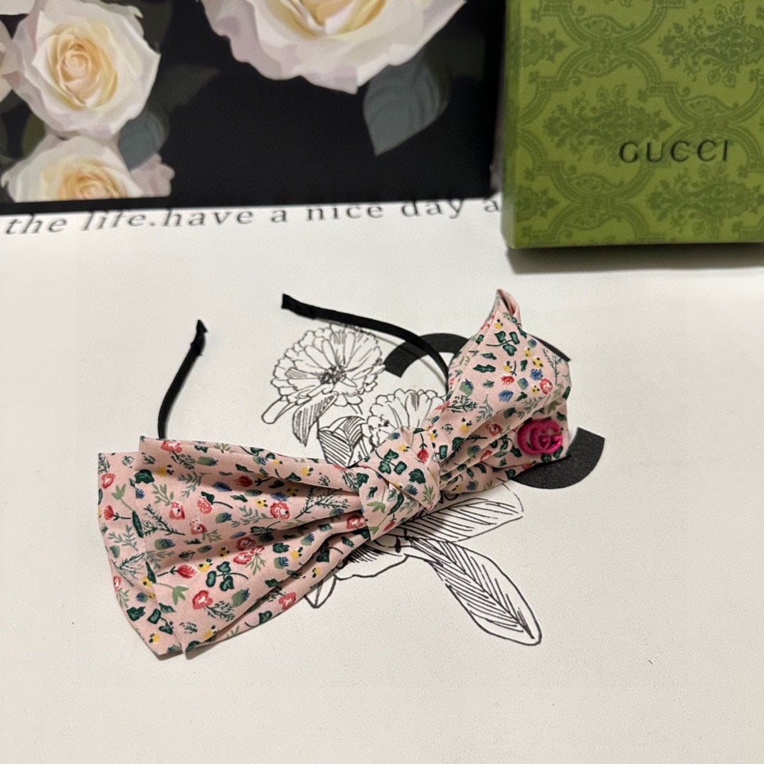 GUCCI HAIRBAND IN LIGHT PINK FLORAL FABRIC 385853