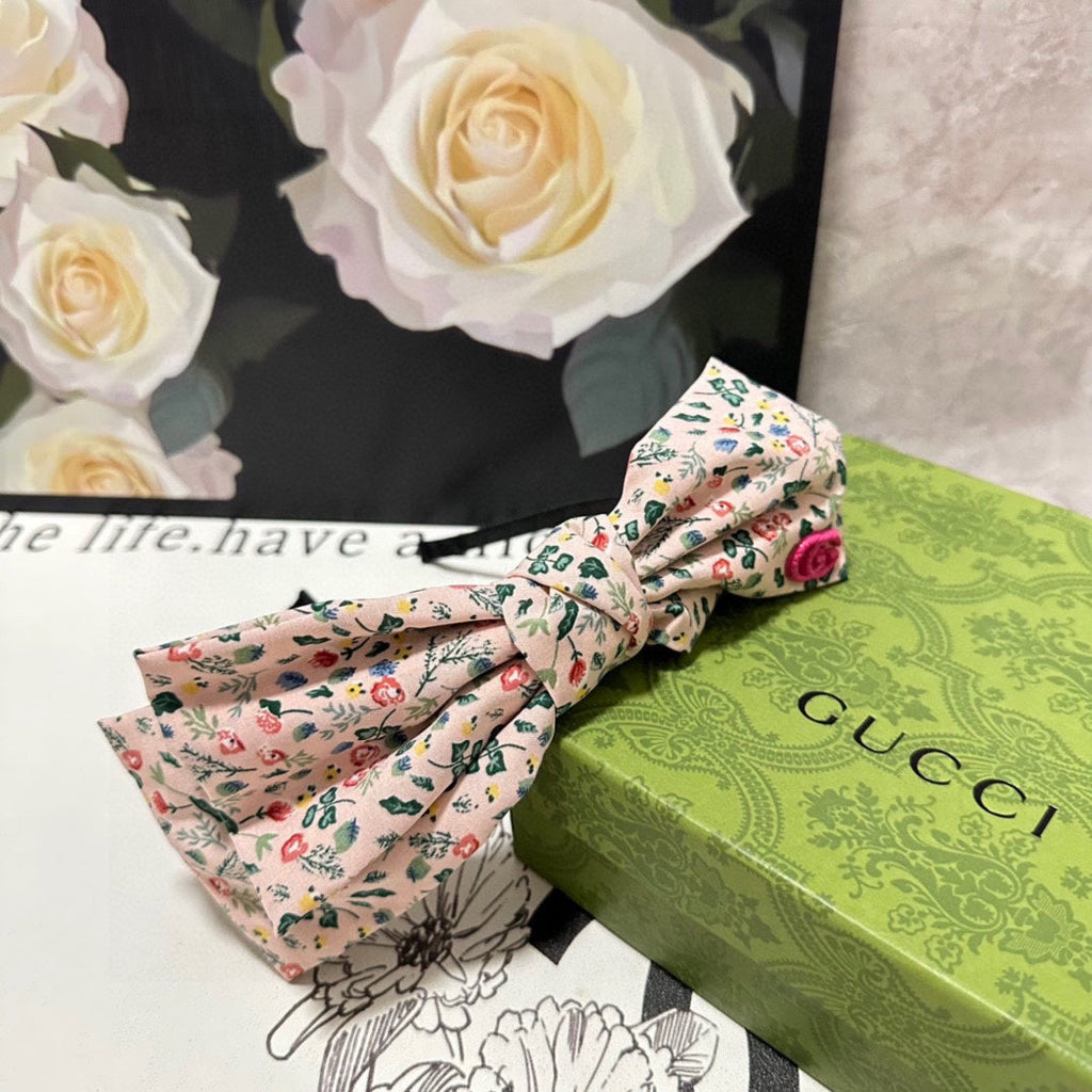 GUCCI HAIRBAND IN LIGHT PINK FLORAL FABRIC 385853