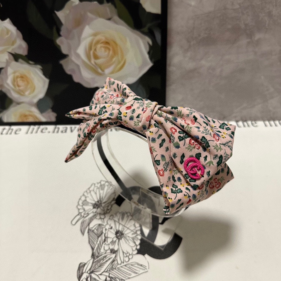 GUCCI HAIRBAND IN LIGHT PINK FLORAL FABRIC 385853