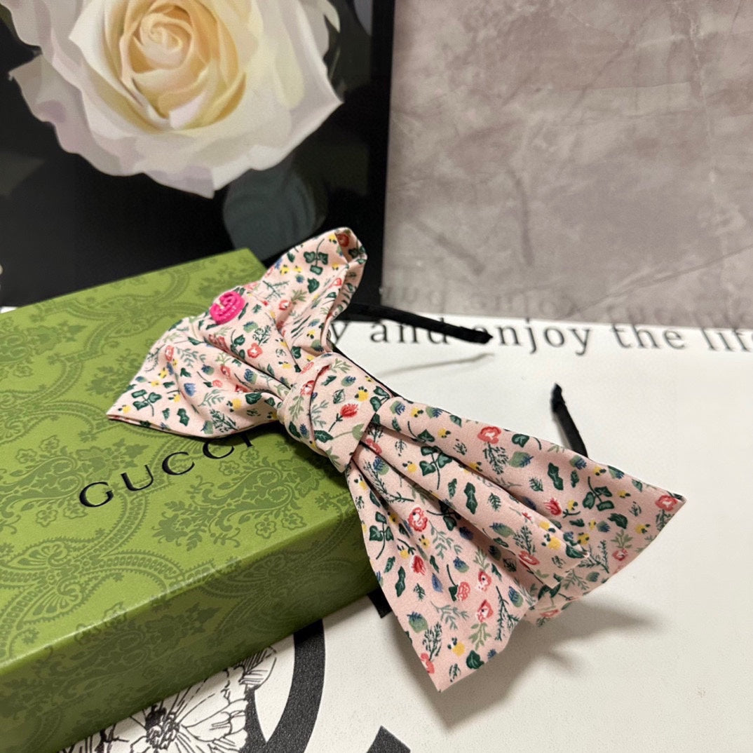 GUCCI HAIRBAND IN LIGHT PINK FLORAL FABRIC 385853