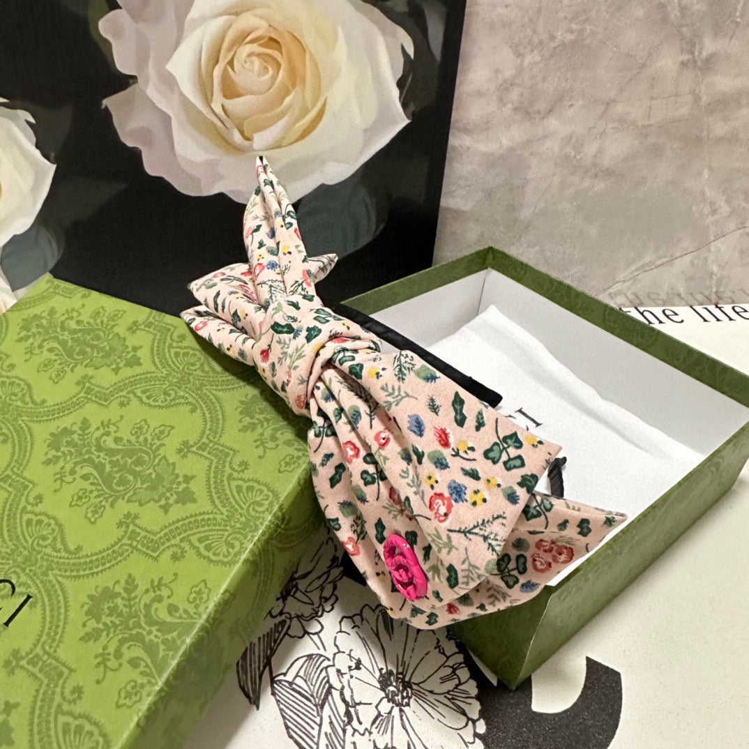 GUCCI HAIRBAND IN LIGHT PINK FLORAL FABRIC 385853