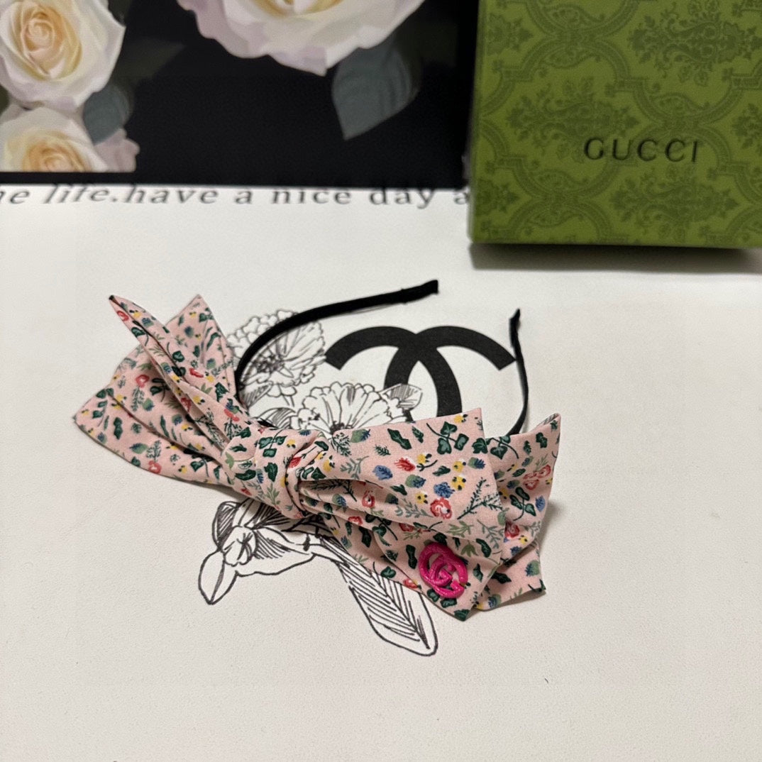 GUCCI HAIRBAND IN LIGHT PINK FLORAL FABRIC 385853