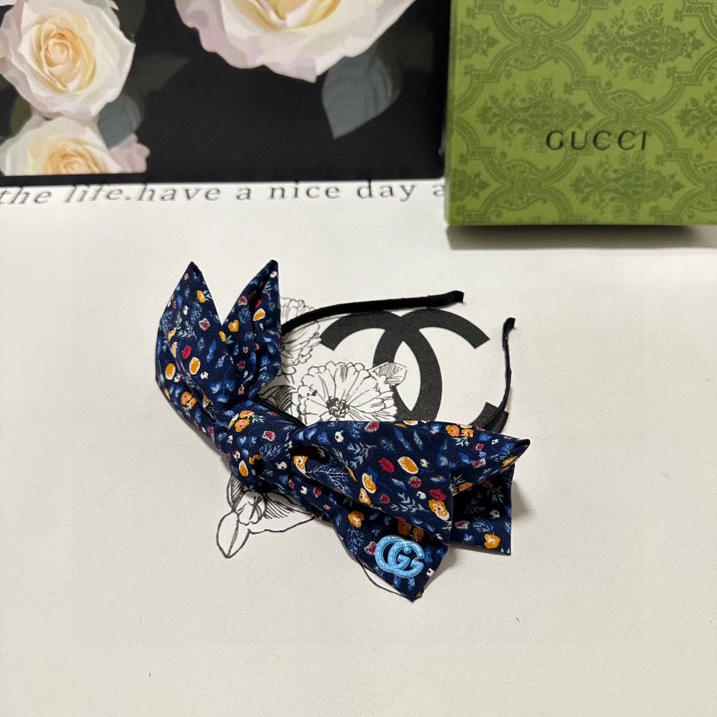 GUCCI HAIRBAND IN NAVY BLUE FLORAL FABRIC 385854