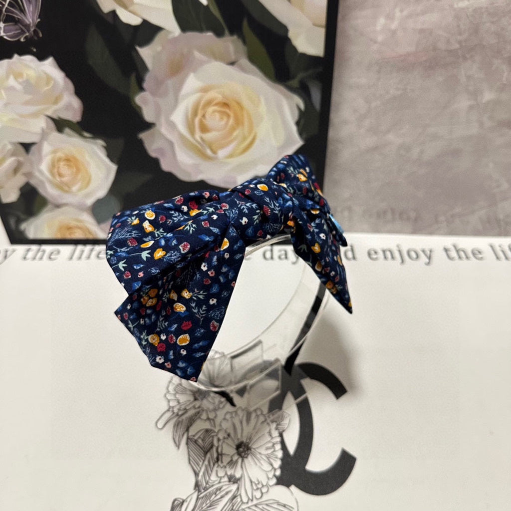 GUCCI HAIRBAND IN NAVY BLUE FLORAL FABRIC 385854