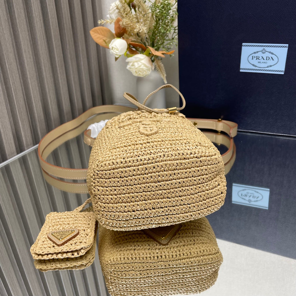 PRADA BUCKET BAG 20 IN BEIGE WOVEN RAFFIA EMBOSSED LOGO