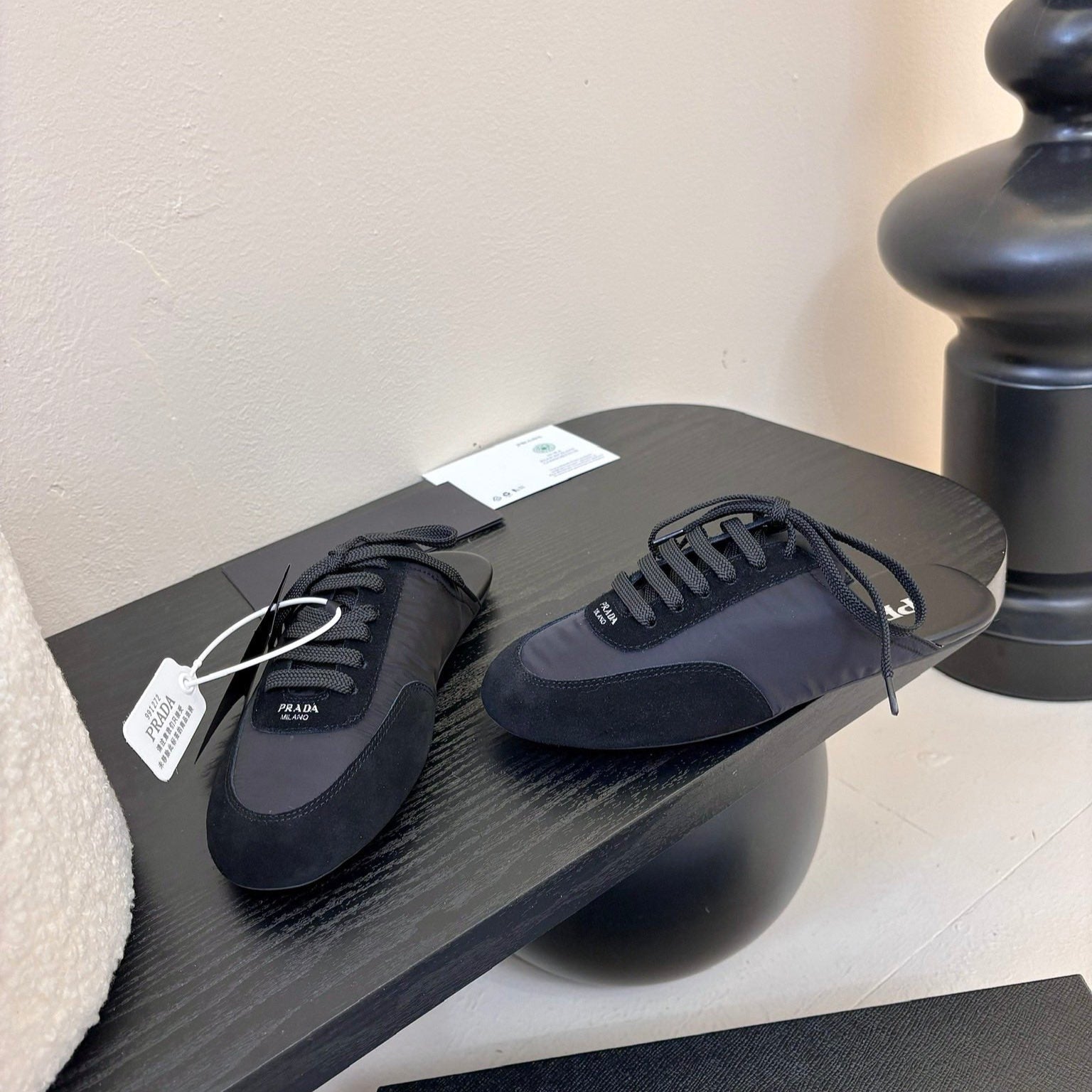 PRADA SNEAKER MULES IN BLACK NYLON AND SUEDE