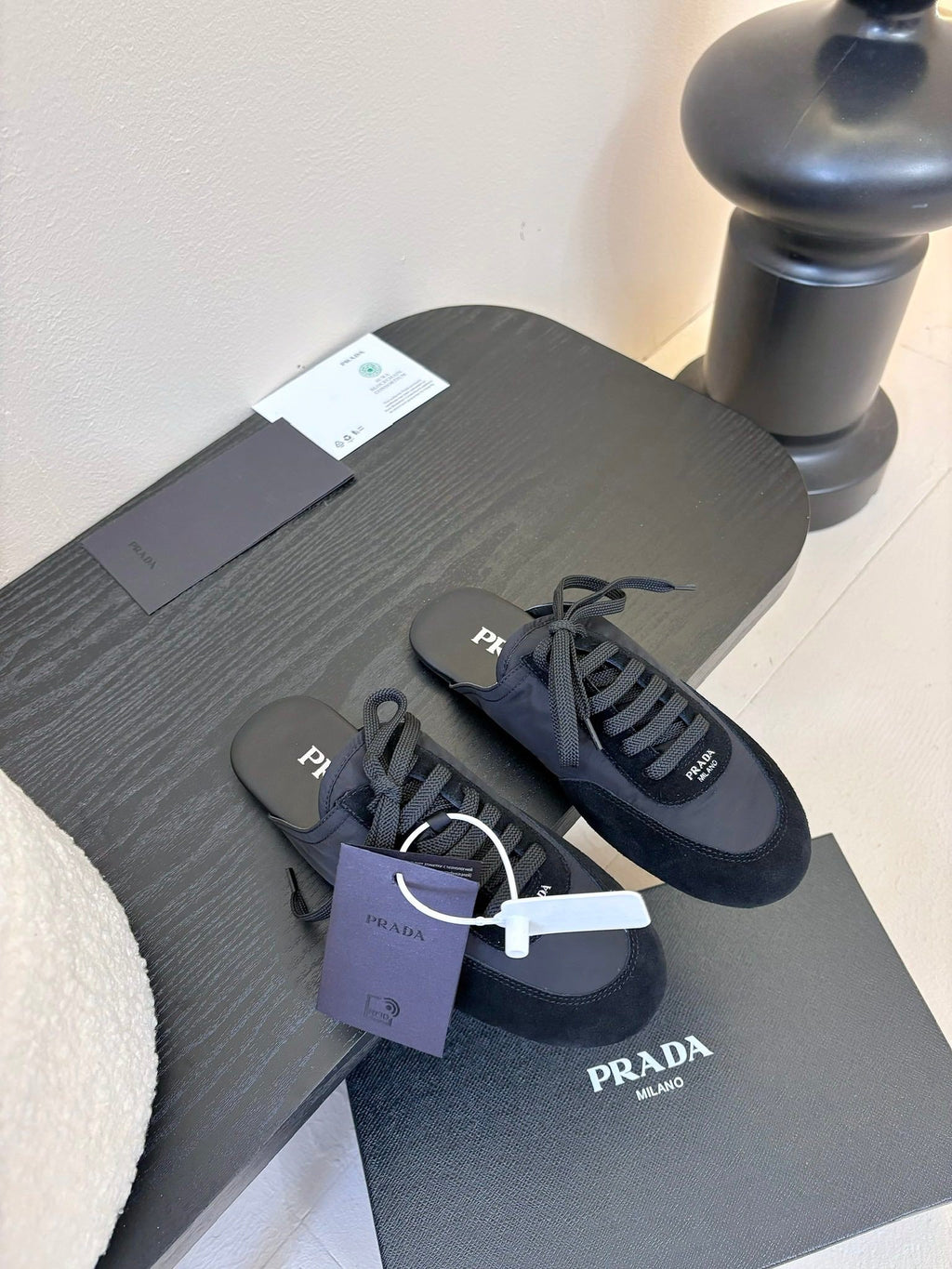 PRADA SNEAKER MULES IN BLACK NYLON AND SUEDE
