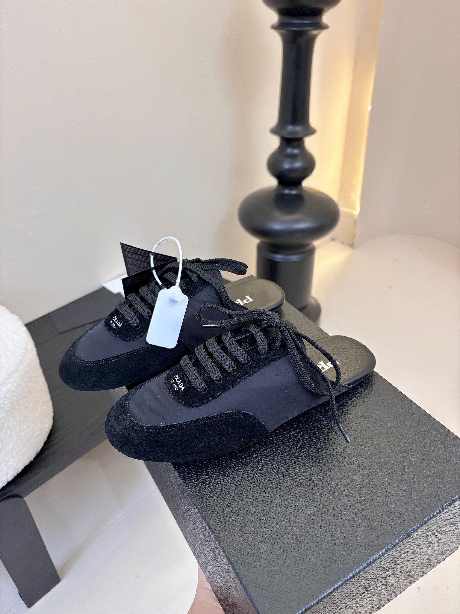 PRADA SNEAKER MULES IN BLACK NYLON AND SUEDE