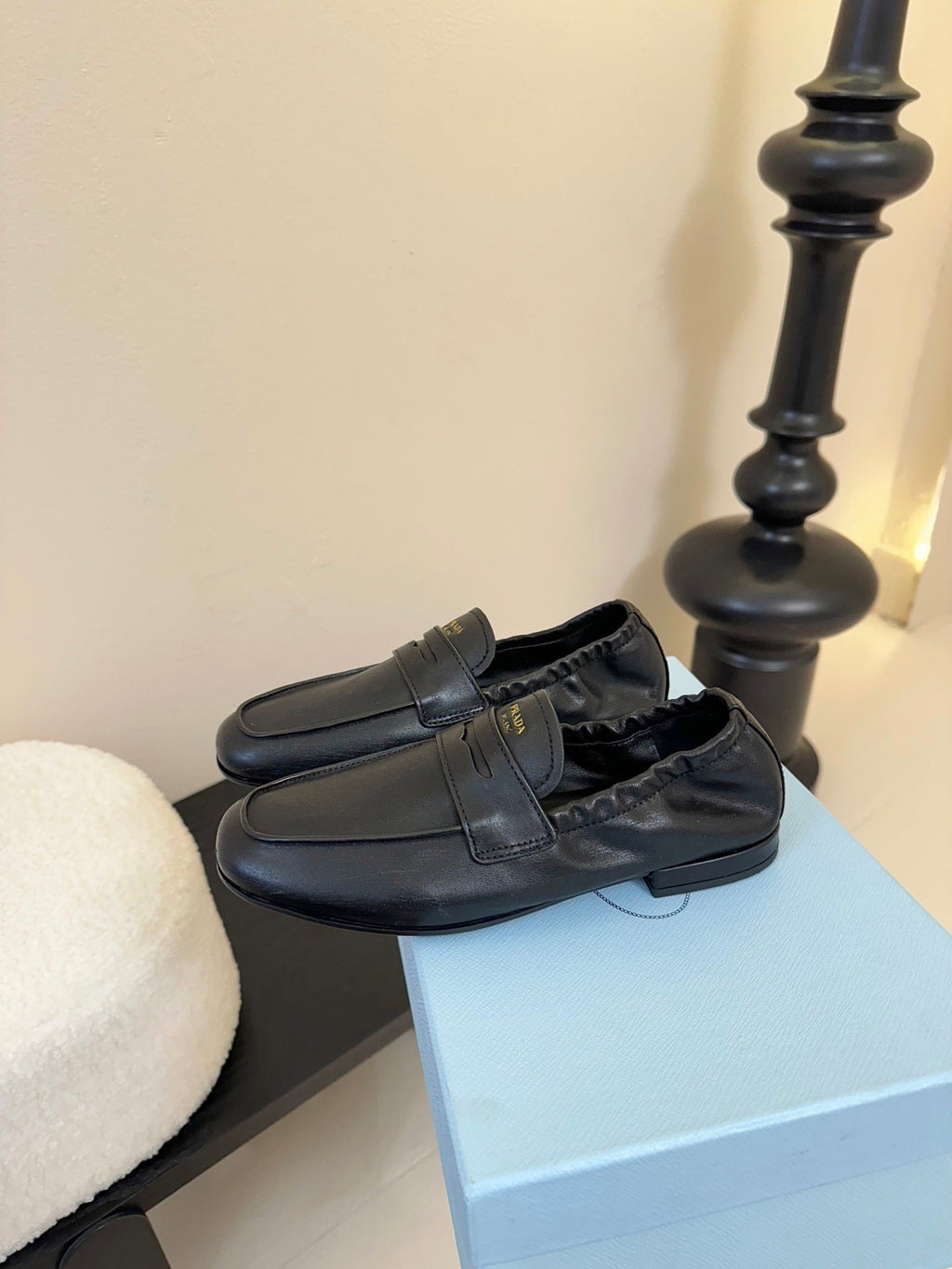 PRADA 25S SHUFFLE LOAFERS IN BLACK CALFSKIN