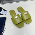 PRADA SAFFIANO PATENT SLIDES OSTRICH MOTIF PEAR CALFSKIN