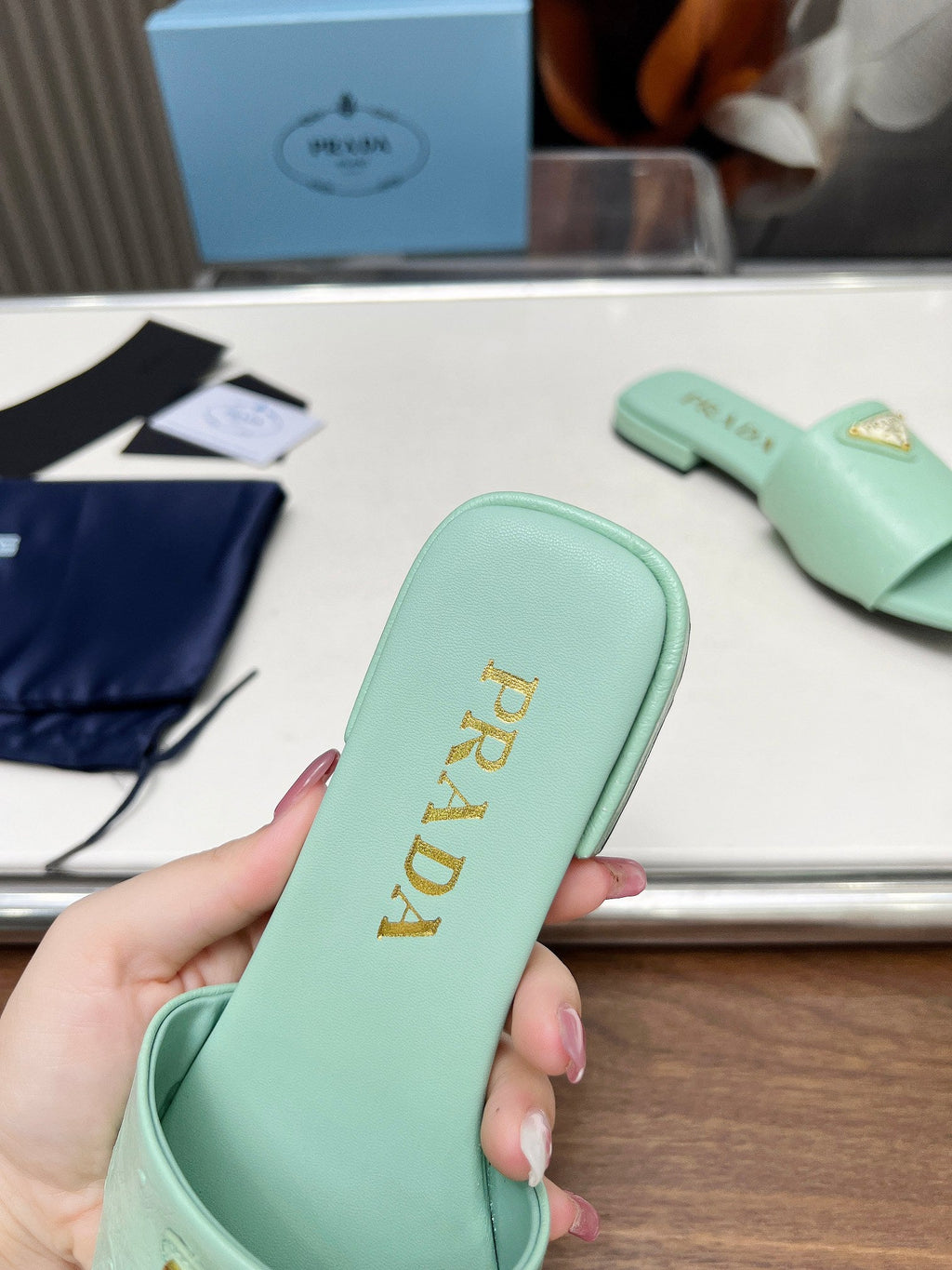 PRADA SAFFIANO PATENT SLIDES OSTRICH MOTIF SEAFOAM CALFSKIN
