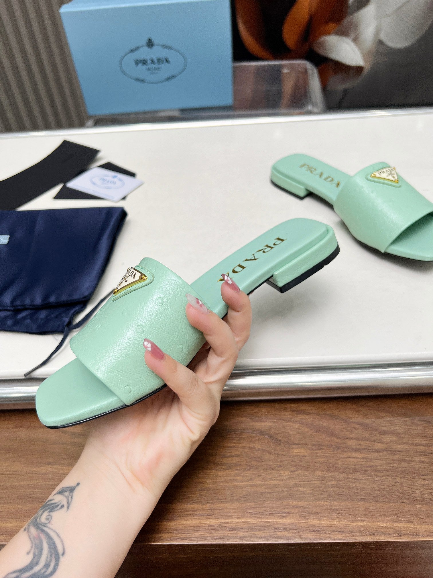 PRADA SAFFIANO PATENT SLIDES OSTRICH MOTIF SEAFOAM CALFSKIN