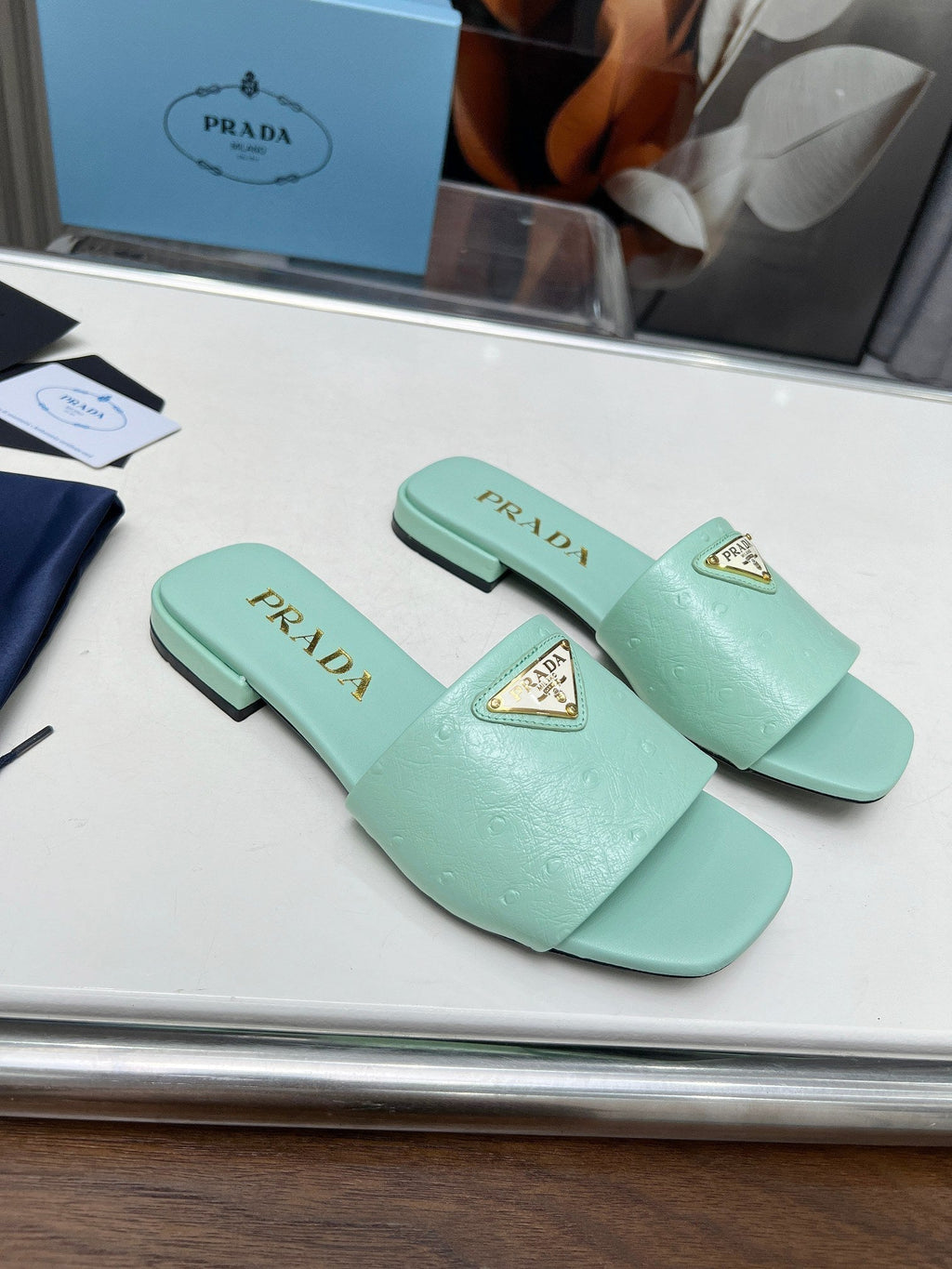 PRADA SAFFIANO PATENT SLIDES OSTRICH MOTIF SEAFOAM CALFSKIN