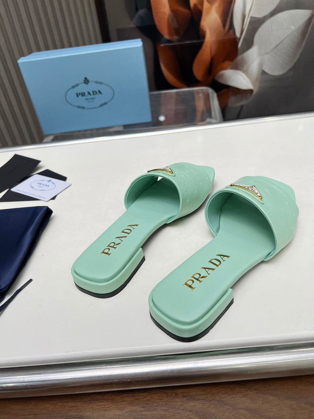 PRADA SAFFIANO PATENT SLIDES OSTRICH MOTIF SEAFOAM CALFSKIN