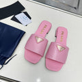 PRADA SAFFIANO PATENT SLIDES OSTRICH MOTIF PINK CALFSKIN