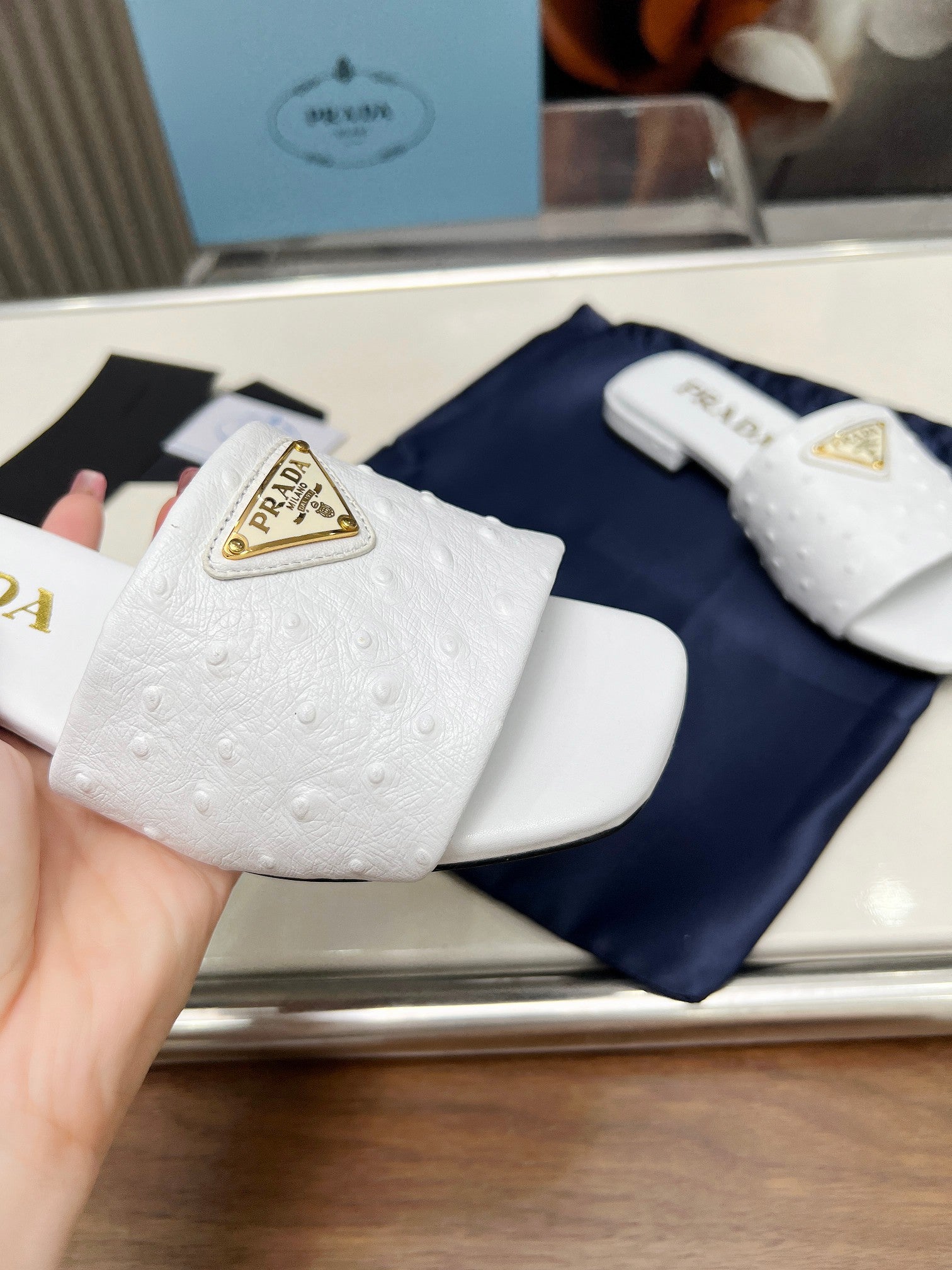 PRADA SAFFIANO PATENT SLIDES OSTRICH MOTIF WHITE CALFSKIN