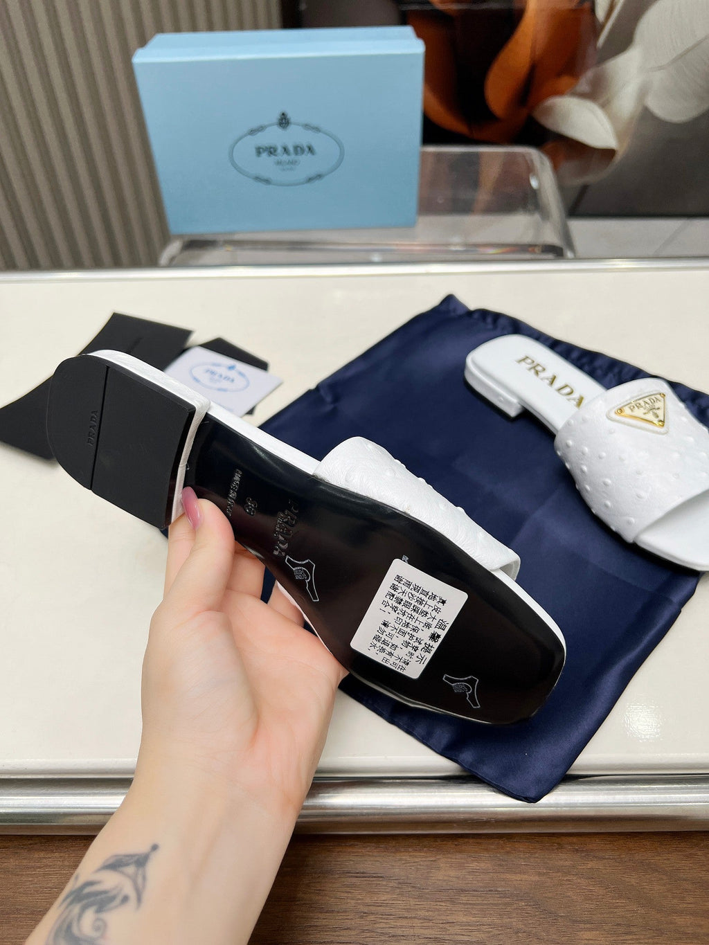 PRADA SAFFIANO PATENT SLIDES OSTRICH MOTIF WHITE CALFSKIN