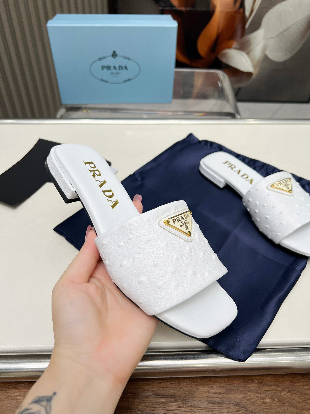 PRADA SAFFIANO PATENT SLIDES OSTRICH MOTIF WHITE CALFSKIN